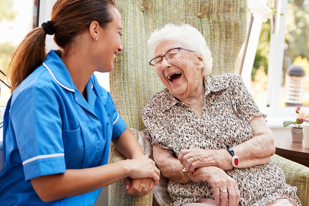 Caregiver supporting a senior at home
